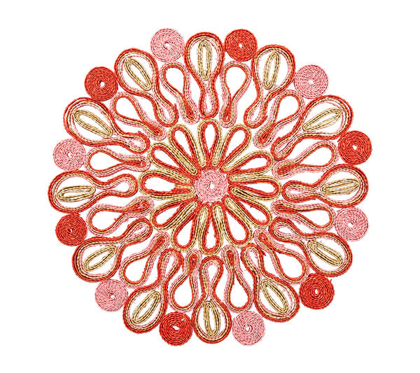 The Marisol Placemat Collection by Kim Seybert features circular mandala patterns with red, pink, and gold swirls on white, creating stunning artisan table mats perfect for elegant decor.