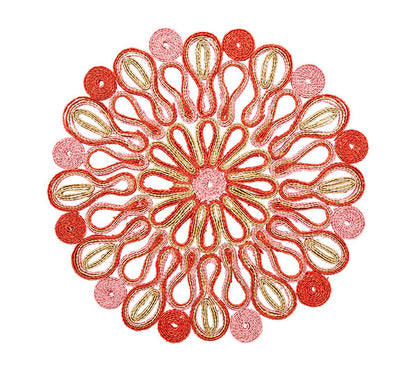 The Marisol Placemat Collection by Kim Seybert features circular mandala patterns with red, pink, and gold swirls on white, creating stunning artisan table mats perfect for elegant decor.