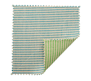 The Kim Seybert Duet Placemat offers a stylish rectangular woven design—blue and beige on top, with a reversible green and beige pattern underneath.