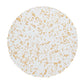 The Kim Seybert Stardust Placemat Collection features round white placemats with irregular gold flecks, hand-crafted to elevate any table setting. Viewed from above against a white background, they bring a stunning touch to your décor.