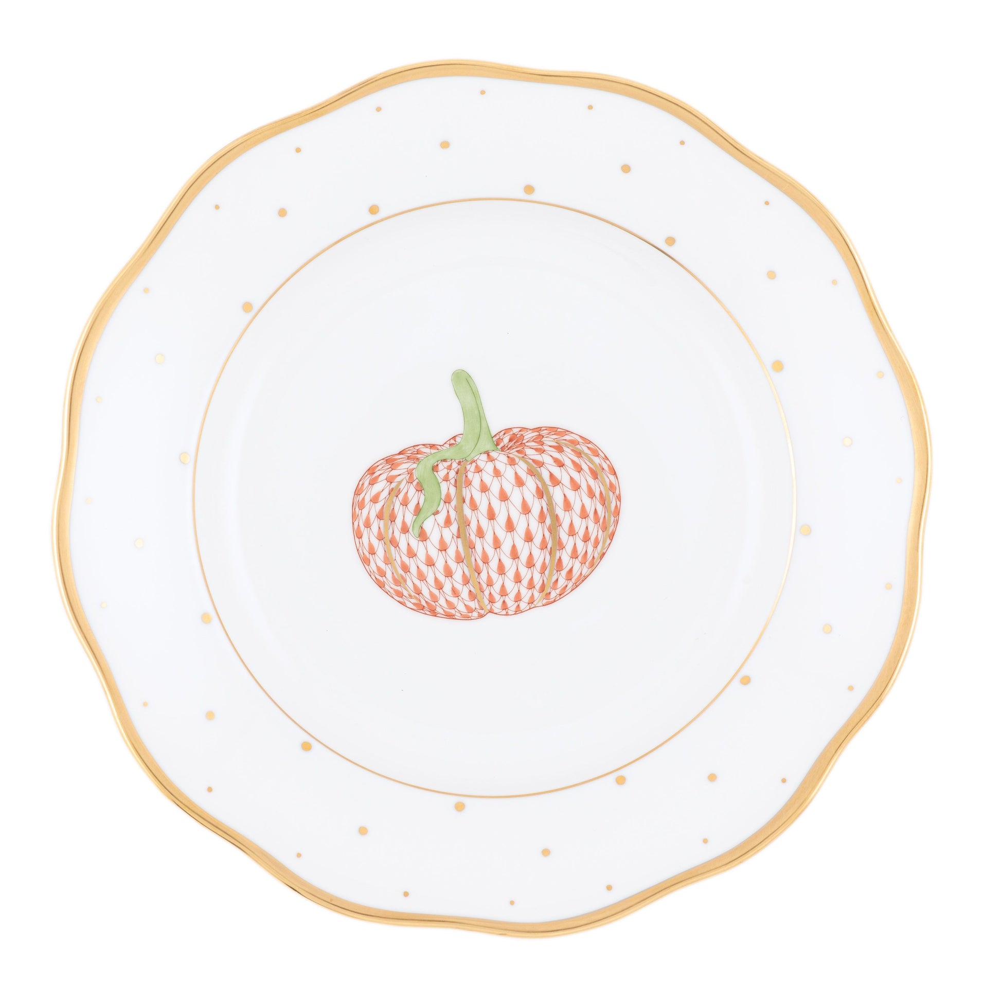 The Herend Fall Dessert Plate features white porcelain adorned with a gold rim and playful polka dots, showcasing an orange patterned pumpkin illustration at its center—making it a charming addition to your harvest season gatherings.