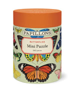 Cavallini Papers and Co's Mini 240 Piece Puzzles come in a cylindrical box with colorful butterfly illustrations on a light green background—ideal for gifting or enjoying a relaxing puzzle session.