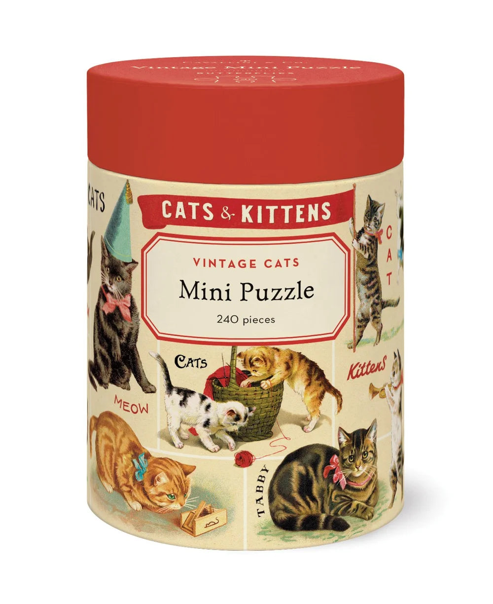 The Cavallini Papers and Co Mini 240 Piece Puzzles come in a cylindrical box with vintage cat and kitten illustrations on a cream background and a red lid—an ideal charming gift for cat lovers.