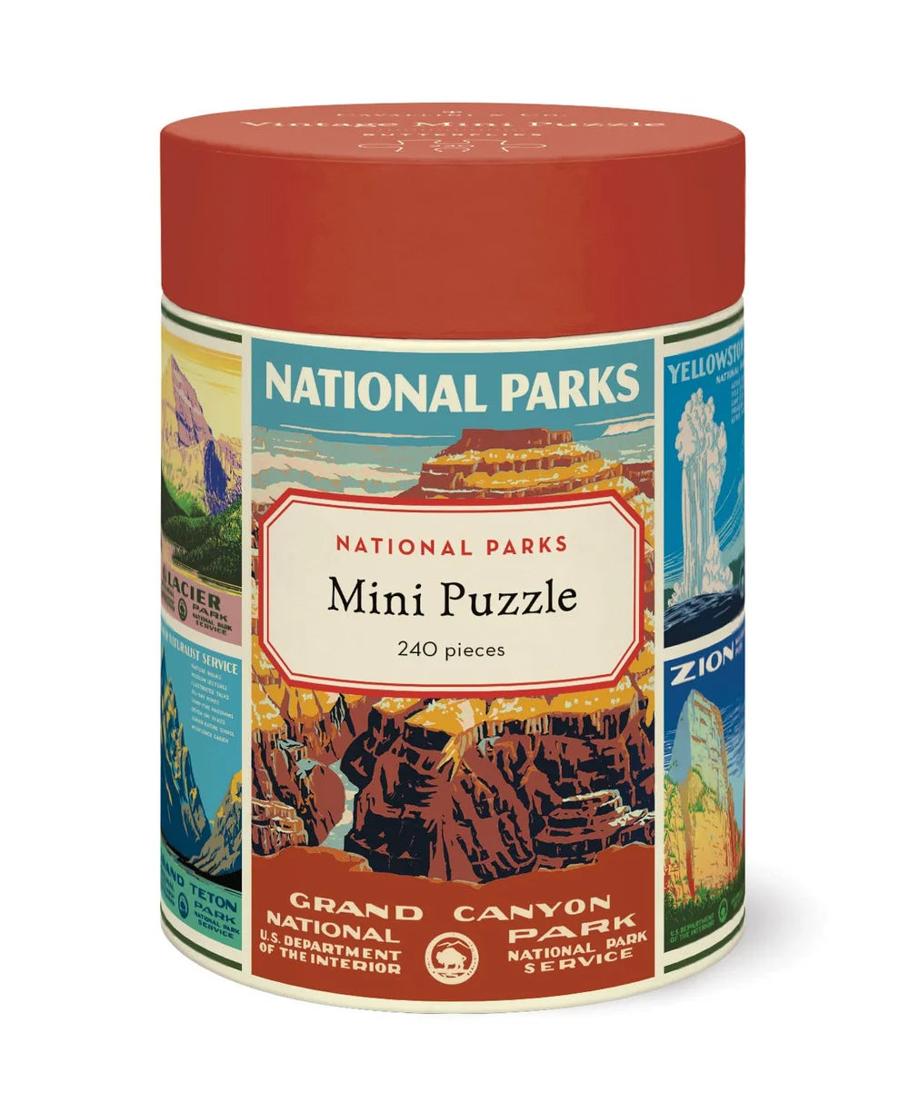 The Cavallini Papers and Co Mini 240 Piece Puzzles come in a cylindrical container, featuring colorful national parks illustrations—the perfect gift for all ages to enjoy a fun puzzle activity.
