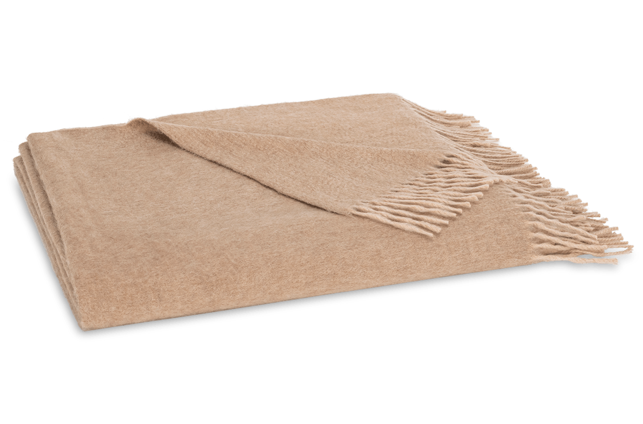 The Matouk Paley Cashmere Throw, featuring elegant fringe detailing, is shown folded on a plain white background.