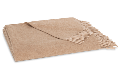 The Matouk Paley Cashmere Throw, featuring elegant fringe detailing, is shown folded on a plain white background.