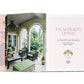 Open book displaying "Palm Beach Living" by Vendome; left page shows a stylish, plant-filled patio with arched columns and lounge furniture, evoking tropical luxury and design excellence.