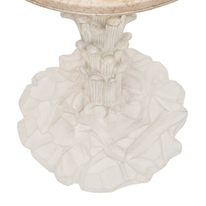 The Palm Drinks Table by Bunny Williams features a white sculpted base with an organic, mushroom-inspired design and a cream stone top—an eye-catching modern accent perfect as a unique side table.