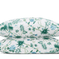 Two stacked pillows from the Matouk Palmyra Bedding Collection in Emerald, featuring a green and blue botanical print on white—perfect for adding a touch of tropical style to your bedding.