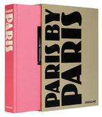 Paris by Paris," a book published by Assouline, features a pink hardcover and a beige slipcase with bold black text, capturing the essence of Paris during the Belle Époque.