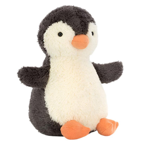 Introducing the Jellycat Peanut Penguin, Medium by Jellycat—a vintage-inspired plush toy boasting a dark gray body, white belly, and vibrant orange beak and feet. This cozy companion sits delightfully against a white background, poised to bring warmth and joy to any occasion.