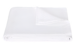 The Matouk White Petra Bedding Collection mattress protector, crafted from white cotton with a quilted matelassé pattern, is neatly folded and displayed on a plain white background.