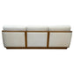A rear view of the McGuire Furniture Schooner Sofa in Outdoor Ivory Chenille, featuring three cushions and a wooden frame, highlights naturalistic materials that lend coastal living charm.