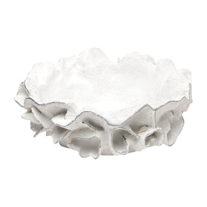 The Coco Bowl in Silver by Made Goods is a white ceramic bowl with an irregular, ruffled edge and a coral-inspired design—ideal as a decorative accent.