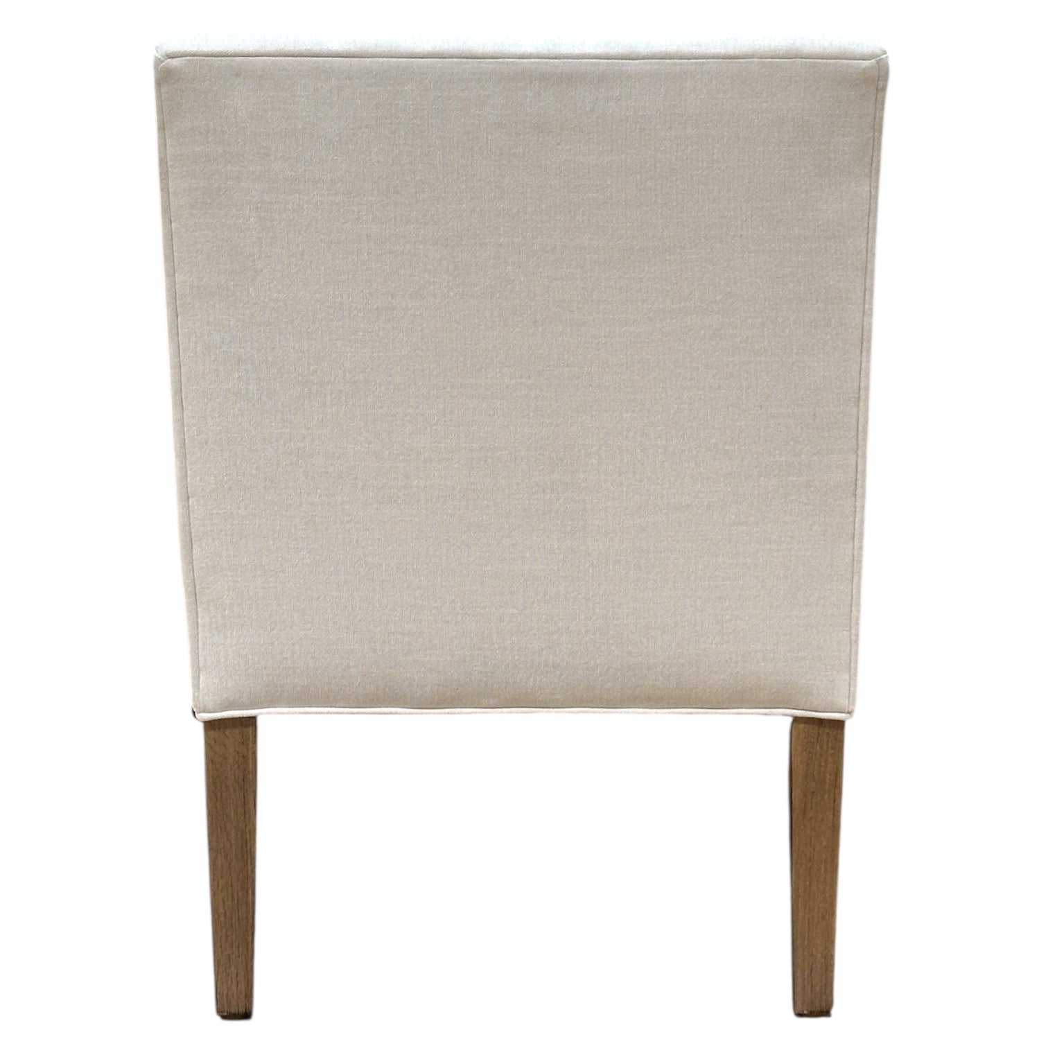The Lee Industries Arm Chair on Casters features comfortable upholstery and wooden legs, shown from the back against a white background.