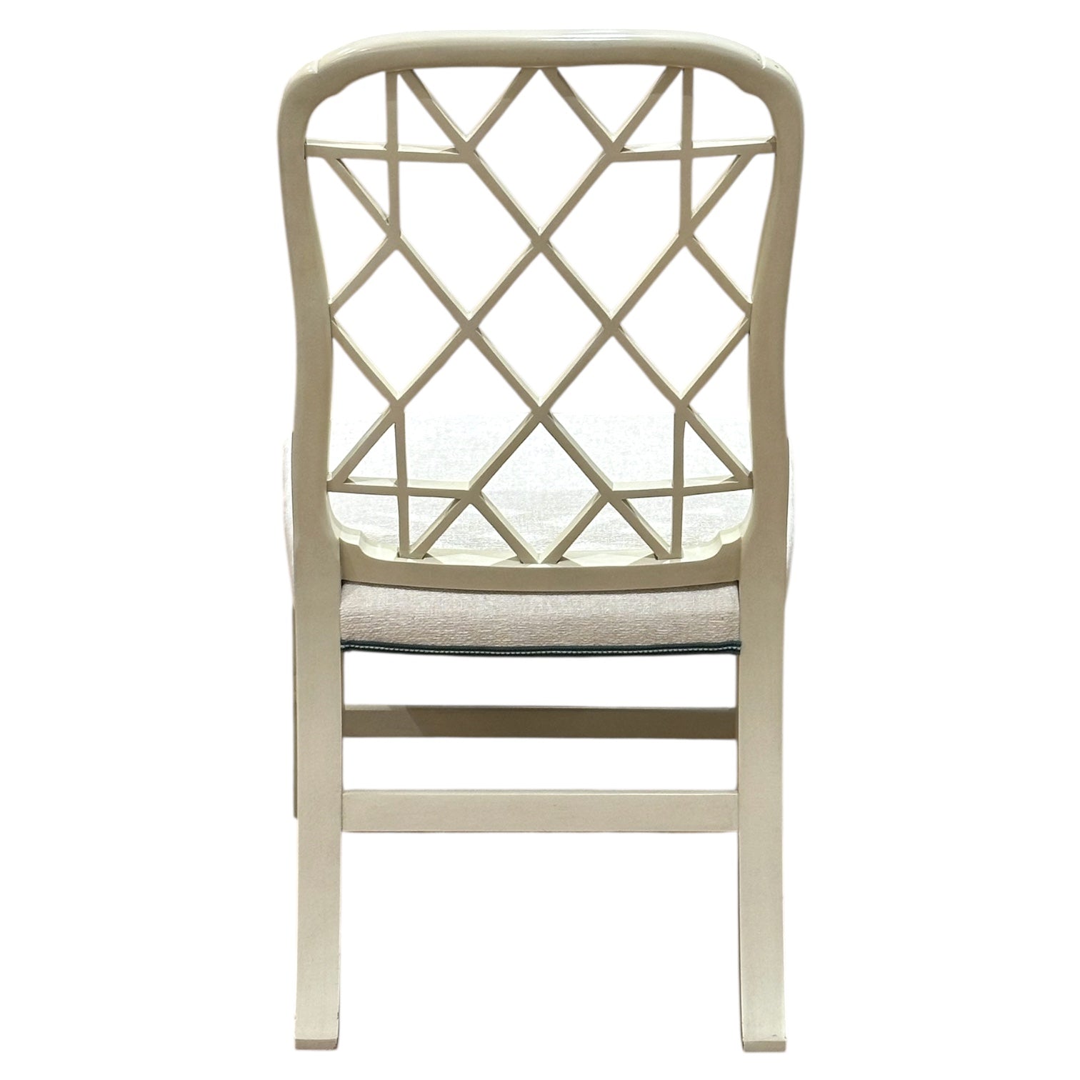 The Linwood Side Chair by Hickory Chair features a beige wooden frame, geometric lattice backrest design, and padded seat, as seen from the rear.