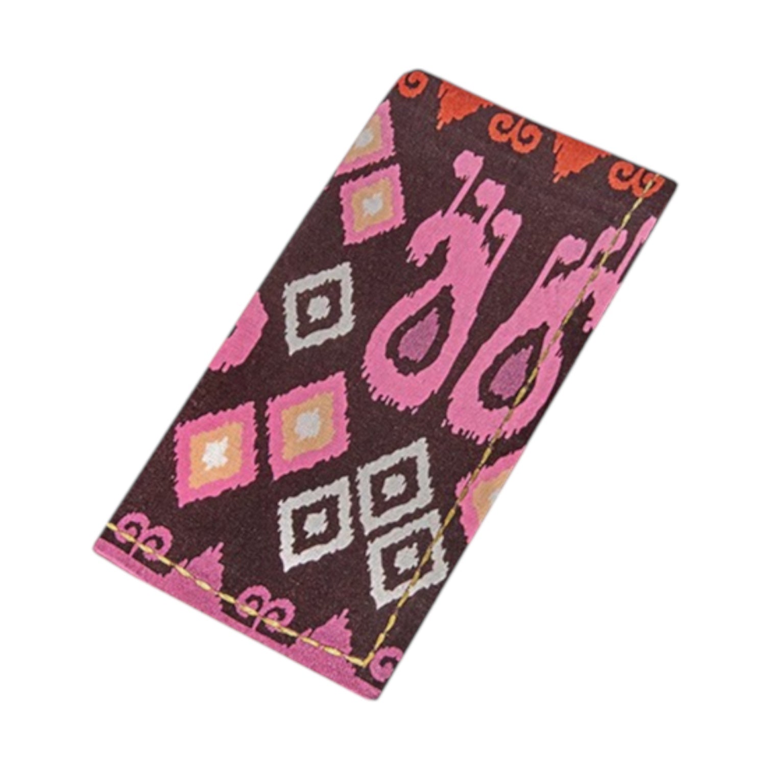 The Dancing Ikat Ganache Collection by Figue features a rectangular textile with a brown base and pink, orange, and white geometric patterns, evoking traditional design and pairing beautifully with any cotton linen dining décor.