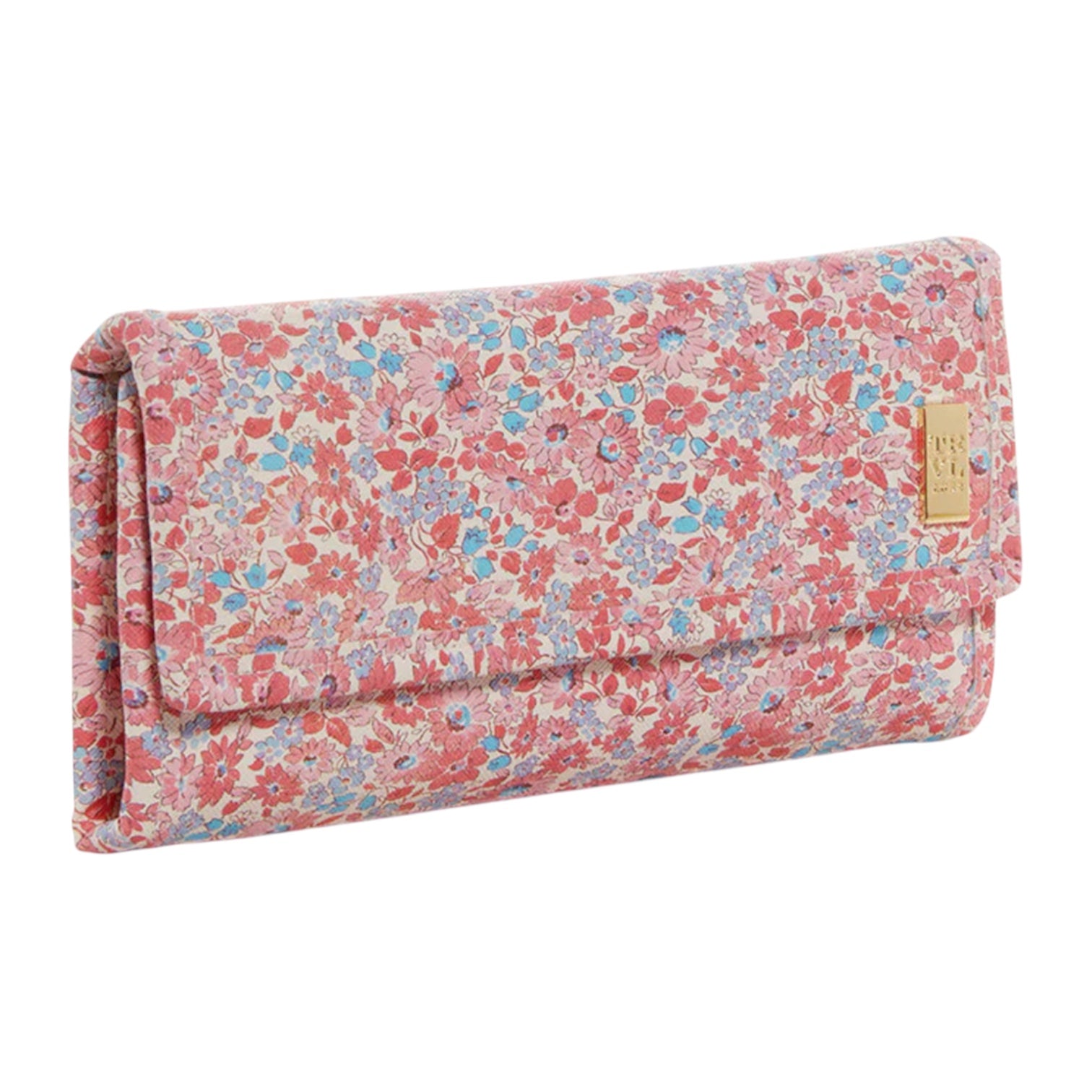 The TRVL Design Luxe Jewelry Wallet is a rectangular, envelope-style case with a pink, blue, and white floral pattern plus a small gold label—perfect for keeping your accessories organized while traveling.