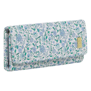 The TRVL Design Luxe Jewelry Wallet is a rectangular case with a blue and green floral pattern and a gold-tone accent plate—perfect for storing your jewelry while traveling.