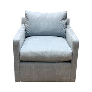 The A. Rudin 749 Lounge Chair features light gray upholstery, a boxy contemporary design, straight armrests, and a matching back cushion, shown from the front against a white background.