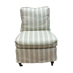 The Lee Industries Slipcovered Chair in Dolly Stripe features a green and white pattern, cushioned seat and back, and short wooden legs.
