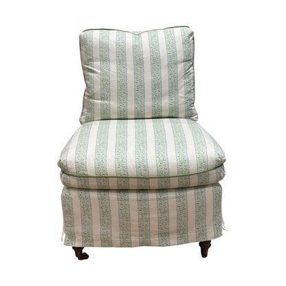The Lee Industries Slipcovered Chair in Dolly Stripe features a green and white pattern, cushioned seat and back, and short wooden legs.