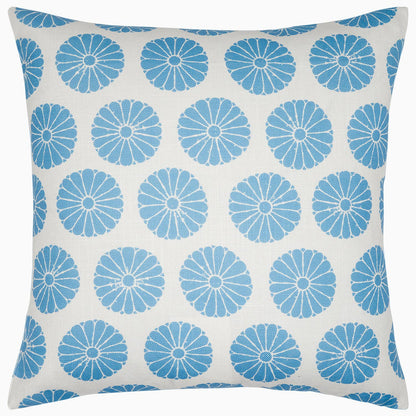 The Aleesa Outdoor Pillow by John Robshaw is a square white pillow with rows of blue circular floral designs. Rain and sun resistant, it's perfect for adding style and durability to your outdoor space.