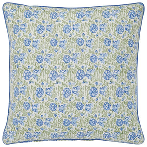 The Amit Pillow by John Robshaw features a blue and green floral pattern on white, accented with blue piping. This decorative pillow adds a fresh touch to any space.