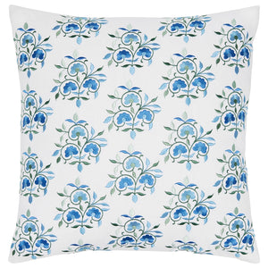 The Ankur Azure Pillow by John Robshaw features a square shape with a white background and a repeating pattern of blue and green embroidered flowers, crafted from soft cotton linen. It includes a hidden zipper closure for easy care and a seamless look.