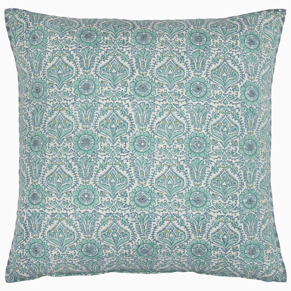 The John Robshaw Razia Mist Decorative Pillow features an intricate blue and green floral pattern on a white background, inspired by evening blooms and hints of sage.