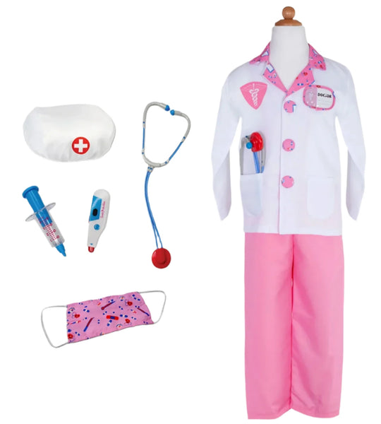 The Great Pretenders Pink Doctor Set with Accessories includes a pink and white lab coat, pants, stethoscope, syringe, thermometer, cap, and mask—ideal for immersive pretend play adventures.