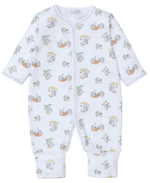 The Kissy Kissy Hedgehog Fall Showers Printed Playsuit by Kissy Kissy is a white baby onesie crafted from soft Pima Cotton, featuring delightful prints of animals and objects such as elephants, umbrellas, flowers, and charming hedgehogs.