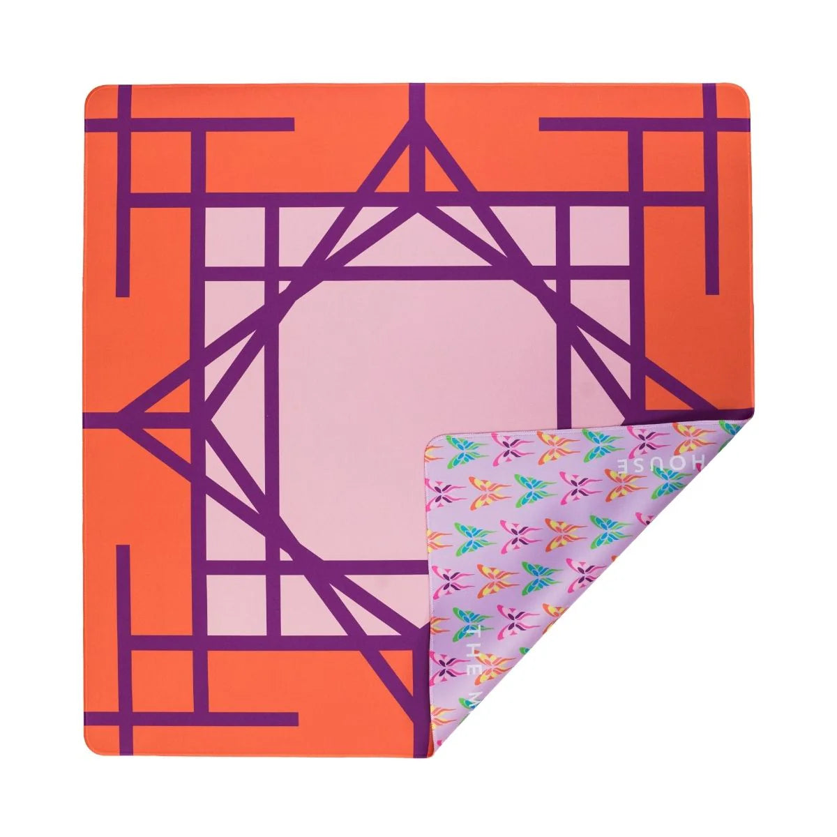 The Mahjong House Double-Sided Travel Mahjong Mats feature an orange and purple geometric pattern on one side and a pink, colorful leaf design with "SNOP" on the reverse—ideal as a portable mahjong mat for travel.