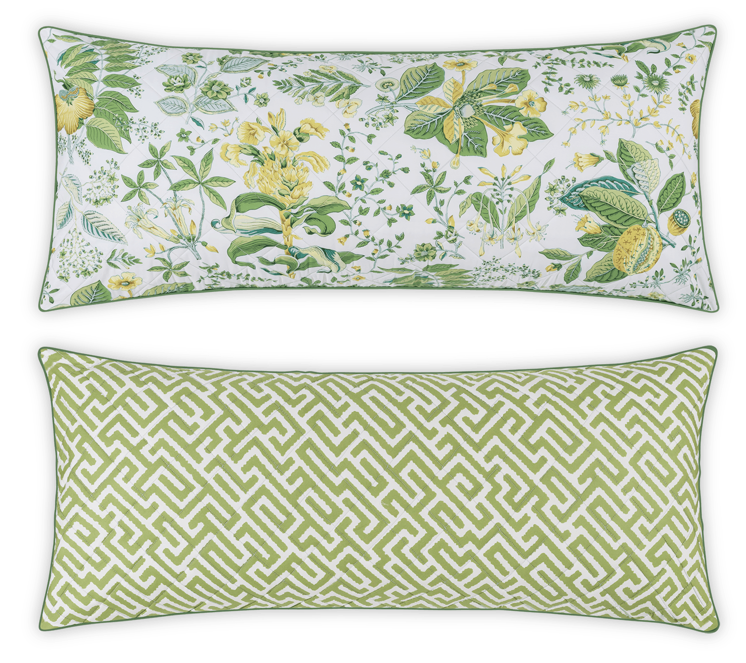The Matouk Reversible Lumbar Pillow Collection includes two rectangular pillows: one with a green and yellow floral print, the other with a green geometric pattern on white—perfect for customizable home decor.