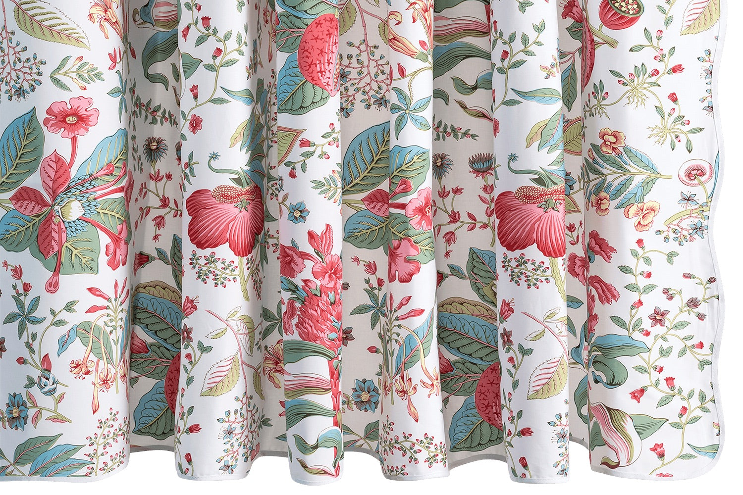 Close-up of a white curtain from Matouk’s Pomegranate Shower Curtain Collection, featuring a colorful botanical floral and leaf print in red, green, blue, and pink tones.