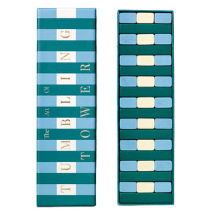 PrintWorks Tumbling Tower—rectangular box labeled with the name beside a stacked block game featuring blue, teal, and white solid wood pieces—for a fun game night.