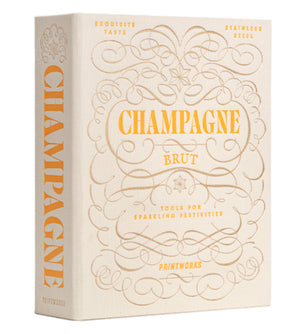 A beige box with ornate gold text, labeled "The Essentials Champagne Tools" by PrintWorks, includes a premium Champagne Opener for sparkling festivities and celebrations.