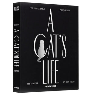 The PrintWorks Photo Album A Cat's Life is a black hardcover pet memory book featuring a cat silhouette on the cover—ideal as a cat photo album or coffee table photo album.