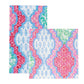 The Caspari Provencale Cotton Pink Multi Collection features colorful geometric and floral rugs in red, blue, green, and pink on white—adding charm to any room—and pairs perfectly with compostable napkins for eco-friendly gatherings.