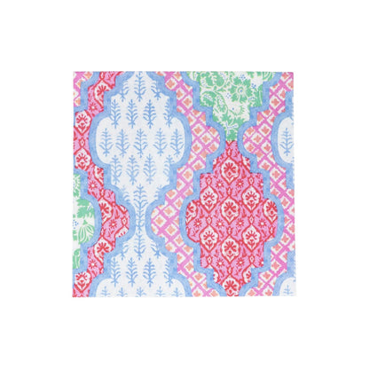 The Provencale Cotton Pink Multi Collection by Caspari features a square tile with a geometric and floral pattern in red, green, blue, and pink on white, inspired by compostable napkin designs.