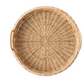The Juliska Provence Rattan Circle Tray is a round, handwoven wicker tray with two side handles, resembling a rattan serving tray. It is shown from above and isolated on a white background.