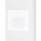A white Assouline book named "Raffles" features a tree logo on the cover, exuding Asian charm, while gold text on the spine adds a touch of British refinement.
