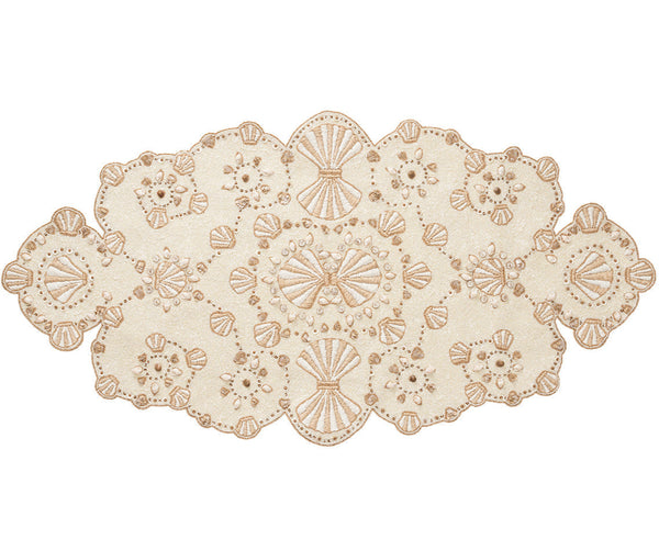 The Kim Seybert Beachcomber Runner by Kim Seybert is a light beige lace doily with floral and geometric patterns, capturing coastal elegance like ocean treasures.