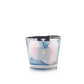 The Baobab Collection Riviera Leopolda Candle features blue and pink marbled wax in a glass holder, topped with a black branded lid, inspired by Baobab’s signature glass-making style.