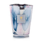 The Baobab Collection Riviera Leopolda Candle features a tall glass design with blue and pink abstract patterns, a gold tree logo label, and is inspired by the elegance of the French Riviera.