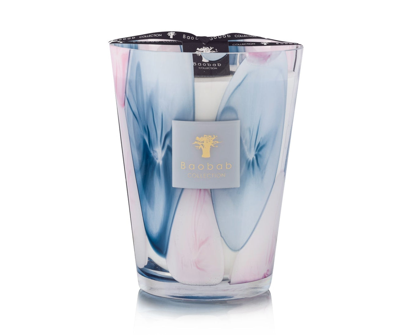 The Baobab Collection Riviera Leopolda Candle features a tall glass design with blue and pink abstract patterns, a gold tree logo label, and is inspired by the elegance of the French Riviera.