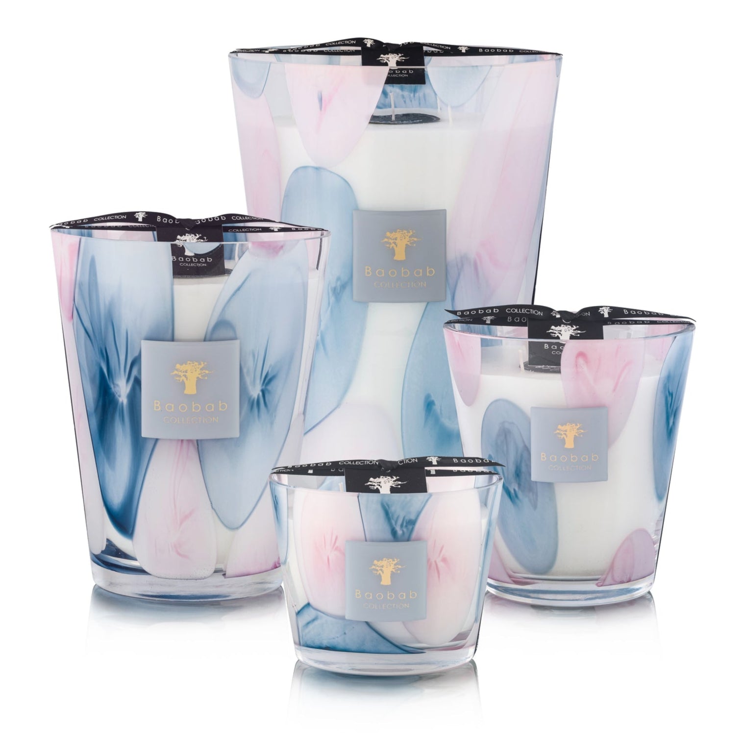 The Baobab Collection Riviera Leopolda Candles feature pastel blue and pink floral designs, reflecting Baobab’s glass-making artistry and the refined elegance of Villa Leopolda.