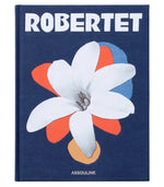 “Robertet: From Seed to Scent” by Assouline features a dark blue cover with a white flower and colorful abstract designs, celebrating natural ingredients in fragrance.