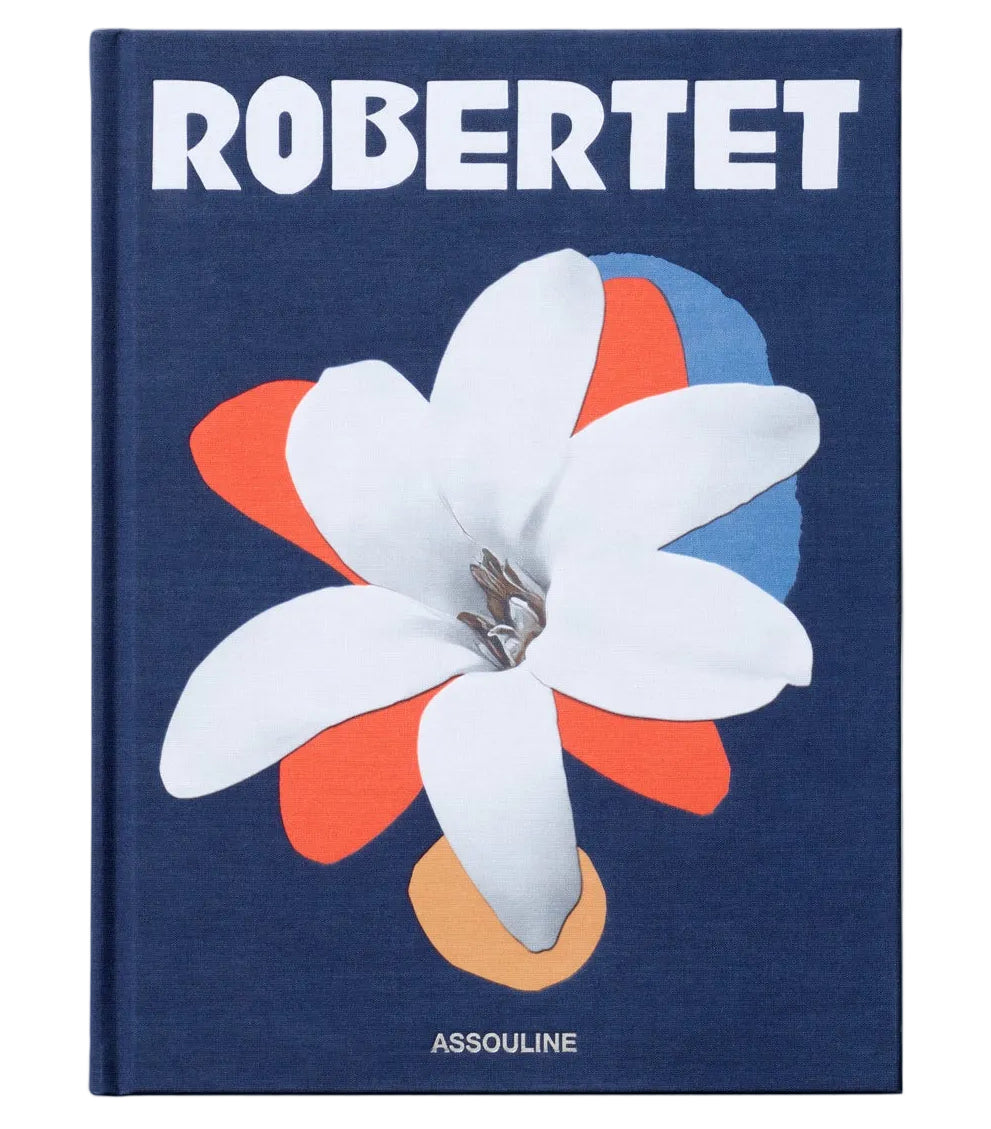 “Robertet: From Seed to Scent” by Assouline features a dark blue cover with a white flower and colorful abstract designs, celebrating natural ingredients in fragrance.