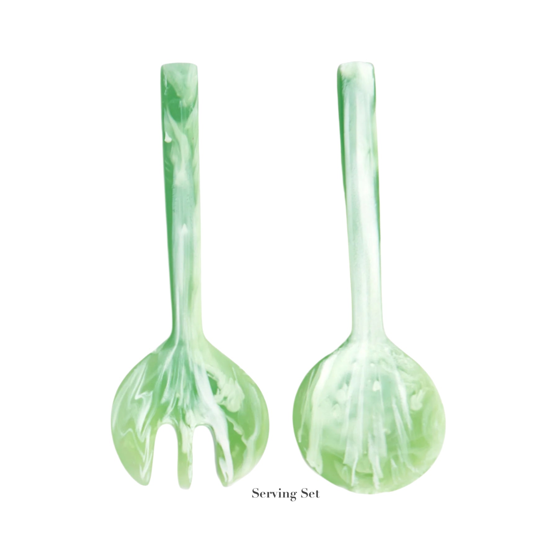 The Nashi Home Mint Resin Serveware Collection includes two green marbled serving utensils, a spoon and fork, displayed upright—stylish, shatter-resistant accents that make perfect home decor.